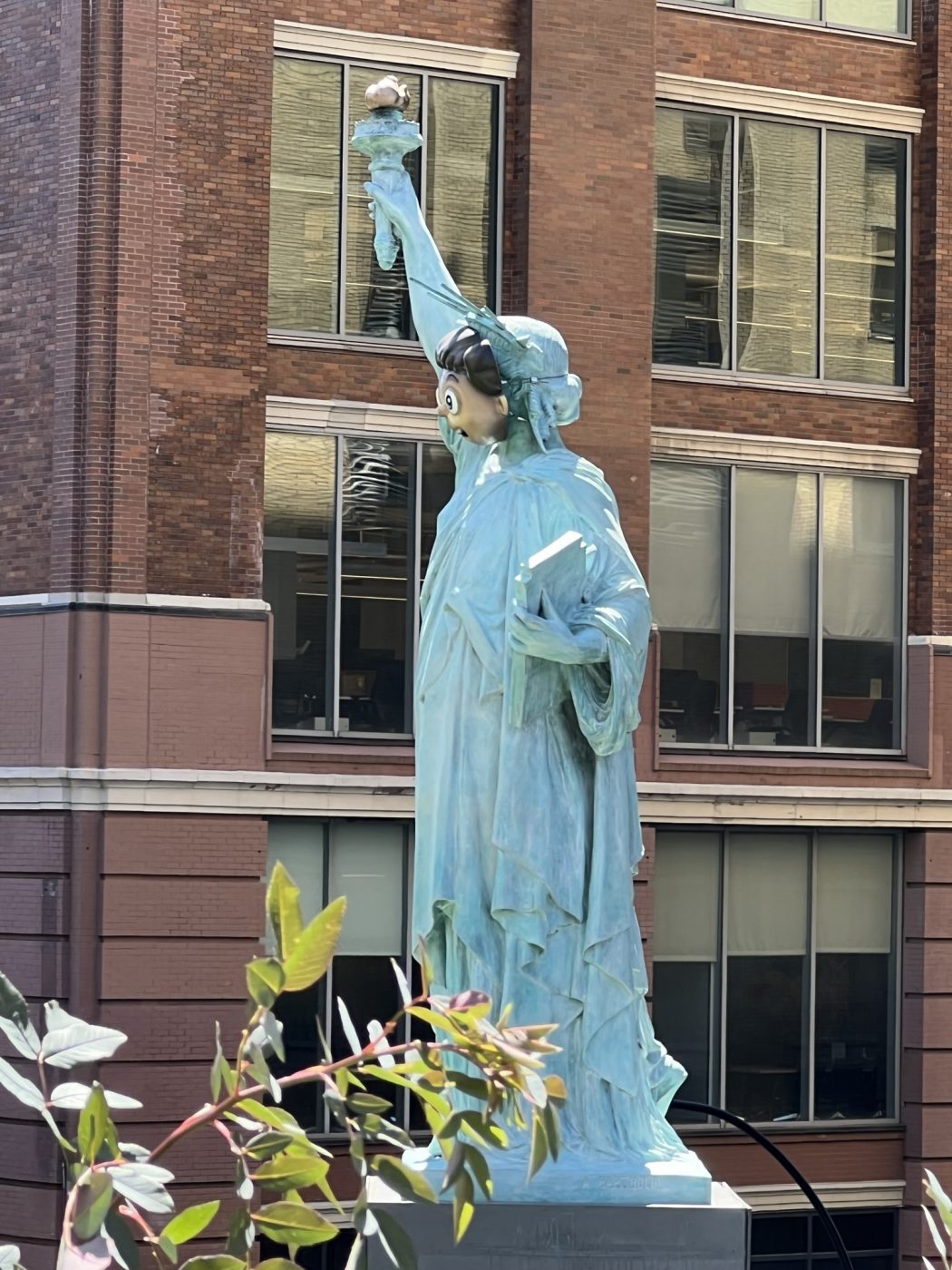 Paola Pivi (painted stainless steel and patinaed bronze installation)